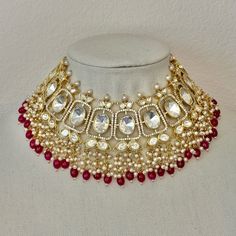 Sabyasachi Inspired Victorian Finish Dual Tone Uncut Polki Foil Kundan Choker Set with Pearls and Stones - Ruby Red Elegant Kundan Necklace For Designer Wear, Elegant Red Kundan Necklace For Reception, Designer Kundan Necklace For Festive Occasions, Elegant Red Kundan Traditional Wear, Designer Red Wedding Set, Red Elegant Traditional Wear, Heavy Designer Kundan Necklace For Festive Occasions, Festive Designer Kundan Necklace With Meenakari, Designer Kundan Meenakari Necklace For Festive Occasions