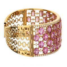 This unbelievable gorgeous 18K rose gold cuff bracelet is filled to the brim with faceted oval pink sapphires. The sapphires are arranged in alternating offset rows and punctuated by round white diamonds. The immaculate design highlights the alluring beauty of the sapphires. Rows of solid rose gold bead-set with round diamonds frame the edges of this 2.5" diameter cuff. If you like what you see but want something more unique to your personal tastes, stop by our Buffalo Grove boutique and talk to Diamond Bracelet Design Unique, Rose Gold Cuff Bracelet, Diamond Cuff Bracelet, Queen Style, Diamond Bracelet Design, Gold Cuff Bracelet, Rose Gold Beads, Tiara Crown, Gold Bracelet Cuff