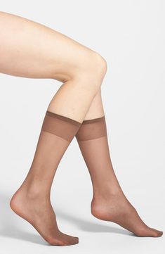 A soft, stretchy band ensures a comfortable, no-slip fit in fine, sheer trouser socks finished with reinforced toes designed to stop runs in their tracks. Style Name:Nordstrom 3-Pack Sheer Knee Highs (Buy More & Save). Style Number: 887288. Micro-elastic Solid Mid-calf Hosiery, Fitted Nylon Socks, Solid Mid-calf Stretch Hosiery, Mid-calf Solid Color Stretch Hosiery, Sheer Fitted Nylon Socks, Sheer Socks With Heels, Socks With Heels, Nylon Socks, Sheer Socks