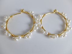 These beautiful fine hoop earrings have beautiful 2 mm freshwater creamy pearls The pearl have a good luster and organic shape They are wire wrapped around gold filled hoops with gold filled wire Diameter of the hoops is 3,00 cm- total diameter is 3,50 cm the pearls are 3 mm Thank you for visiting my shop and if you wish personalized jewels or wish more details, please contact me. I'll be happy to help Thanks for stopping by. See my other handcrafted precious jewels here: http://www.etsy.com/sho Gold Wire Wrapped 14k Gold Filled Pearl Earrings, Delicate Gold Wire Wrapped Hoop Earrings, Pearl Hoop Earrings Wire Wrapped For Gift, Pearl Wire-wrapped Hoop Earrings As Gift, Pearl Wire Wrapped Hoop Earrings As Gift, Gold Wire Wrapped Pearl Hoop Earrings, Handmade Pearl Yellow Gold Hoop Earrings, Gold Wire Wrapped 14k Gold-filled Pearl Earrings, Gold Wire Wrapped Pearl Earrings In 14k Gold