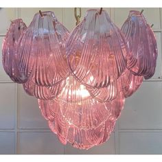 a pink chandelier hanging from the ceiling