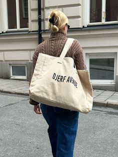 "Made from natural fibers in 100% jute, this large shopper bag has a natural and rustic outside, while the inside has a lining made from certified organic cotton. It closes with a magnetic button and has an inside pocket big enough to fit your keys, your wallet or your phone. It is great to use for a day at the beach, for shopping, to the gym, or for traveling and being on the go.    Be careful to wear this bag against sensitive fabrics as the surface has a rough and natural characteristic. " On The Go Bag, Large Shopper Bag, Go Bag, Go Bags, Homewares Shop, Frankies Bikinis, Swim Accessories, Be Careful, Sweaters Knitwear