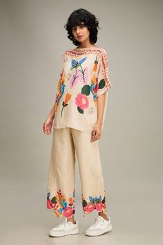 Beige kimono top with floral print and bead embellishment. Paired with pant. - Aza Fashions Bohemian Sets With Floral Embroidery For Summer, Summer Sets With Multicolor Embroidery And Printed Motifs, Bohemian Beige Sets For Spring, Bohemian Spring Sets With Printed Motifs, Bohemian Beige Floral Print Set, Bohemian Summer Pants With Printed Motifs, Summer Bohemian Pants With Printed Motifs, Bohemian Sets With Floral Embroidery For Spring, Floral Embroidery Wide Leg Sets For Summer