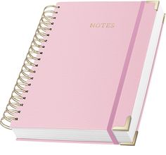 a pink notebook with the word notes written in gold foil on it's cover