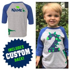 **All Designs shown in our shop or on our site are Registered Copyrights by Shirt Traveler, LLC. This is a perfect Shirt for your toddlers Birthday or just for everyday wear! Let us know what number you would like on front, and what name on back at check out. Contact us if you would like something special and different. We can do anything! :) *4.5 oz., 60/40 combed ringspun cotton/polyester *3/4 sleeves Fun Blue Tops For Birthday, Blue Dinosaur Print Top For Playtime, Blue Summer Birthday Shirt, Blue Dinosaur Print Long Sleeve Top, Blue Long Sleeve Dinosaur Print Top, Long Sleeve Blue Top With Dinosaur Print, Casual Blue Birthday Tops, Blue Shirt For Summer Birthday, Blue Long Sleeve Top With Dinosaur Print