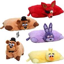 four different styles of stuffed animals laying on top of each other in various colors and sizes