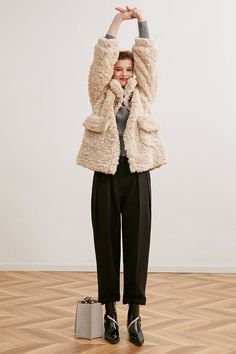 A fur jacket with a fluffy and voluminous silhouette that creates a romantic atmosphere. The front can be fastened with a band, and the high neck design protects your neck from the cold. 
 
 
 
 
 Size 
 
 
 S size 
 
 Length: 69cm 
 Shoulder width: 45cm 
 Bust: 116cm 
 Sleeve length: 55cm 
 
 M size 
 
 Length: 70cm 
 Shoulder width: 46cm 
 Bust: 120cm 
 Sleeve length: 56cm 
 
 
 
 
 
 Material 
 
 Polyester 
 
 
 Model worn 
 
 Wearing size 
 
 S size 
 
 Model dimensions 
 
 Height: 170cm 
 B Fluffy Beige Fur Coat For Fall, Beige Long Sleeve Fluffy Fur Coat, Beige Faux Fur Coat For Winter, Beige Faux Fur Coat For Cold Weather, Winter Beige Faux Fur Coat, Fluffy Beige Fur Coat For Winter, Fluffy Cozy Fur Coat For Winter, Cozy Fluffy Fur Coat For Winter, Winter Beige Fluffy Fur Coat