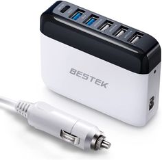 a white and black device with four usb ports