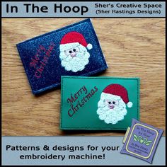 two christmas themed wallets with the words merry christmas on them and santa's face