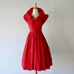 40s Fit & Flare New Look Dress With A Gorgeously Pleated Skirt In The Cheeriest Red. This Dress Will Stop Hearts When You Sweep Into The Room Wearing It. A Dramatic And Lovely Dress For The Holidays! *Crinoline Used To Show Some Of The Fullness Of The Skirt (Can Be Even Fuller). Dress Slips On Over Your Head. Xs-M Measurements: Bust: 34" Max Waist: 26" Max Hips: Open Total Length: 43" Condition: Very Good. But, There's A Bit Of Seam Stress On The Bodice & Very Faint Under Arm Stains. 40s Red Dress, Red Sleeveless 1950s Dress, Retro Red Ruffled Dress, Red 1940s Dress, Red Vintage Dress With Doll Collar, New Look Dresses, Holiday Party Dress, Medium Dresses, Holiday Party Dresses