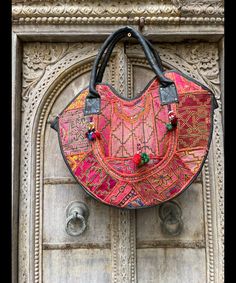 About bag  Indo-gypsy fusion, everyday use hand bag made from Banjara fabrics sourced from Vintage tribal costumes of regions of Rajastan and Gujarat. These are embellished with light catching coins, and intricate bead work tassels. Size - length 15 inches/ width 21 inches Company details:  Company name: Houseoftextile  Contact number: +919784447473  Email id: houseoftextile77@gmail.com  Shipping & custom : Delivery through one of the finest service providers : Skyway, Fedex, UPS  And DHL. Any l Cute Nike Shoes, Email Id, Cute Nikes, Messenger Bags, Gmail Com, Bag Making, Bead Work, Ups, Accessory Gift