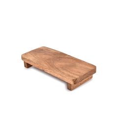 a small wooden bench on a white background