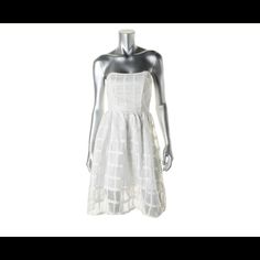 Everleigh White Lace Strapless Lined Casual Dress Xs. Manufacturer: Everleigh Size: Xs Size Origin: Us Manufacturer Color: White Condition: New With Tags Style Type: Shirt Dress Collection: Everleigh Silhouette: A-Line Sleeve Length: Strapless Closure: Exposed Back Zipper Dress Length: Knee-Length Total Length: 32 Inches Bust Across: 14 1/2 Inches Waist Across: 12 1/4 Inches Hips Across: Inches Material: 100% Polyester Fabric Type: Lace Specialty: Lined Elegant Spring Strapless Dress Lined, Elegant Spring Strapless Lined Dress, Spring Cocktail Strapless Dress With Lined Detail, Elegant Sheer Strapless Dress For Summer, Spring Strapless Sheer Dress, Spring Sheer Strapless Fitted Dress, Spring Sheer Fitted Strapless Dress, Strapless Sheer Spring Dress, Sheer Fitted Strapless Dress For Spring