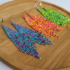 Add a playful touch to your summer style with our Summer Vibes Fringe Earrings! These zesty lime green earrings feature a fun beaded fringe, perfect for adding a pop of color to any outfit. Get ready to rock some serious summer vibes! Summer Dangle Tassel Earrings, Green Tassel Beach Earrings, Summer Turquoise Beaded Tassel Earrings, Trendy Green Dangle Tassel Earrings, Turquoise Beaded Tassel Earrings For Summer, Beach Green Tassel Earrings, Trendy Multicolor Beaded Earrings For Summer, Colorful Fun Summer Earrings, Trendy Green Tassel Dangle Earrings