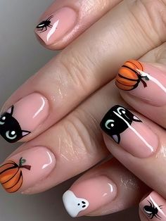 We rounded up the best halloween nail designs that are trending, from French manicures to textured nails to chrome finishes and more. Nail For Halloween, Minimalist Nails Halloween, Nail Art Halloween Easy, Little Ghost Nails, Cat Nails Halloween, Halloween Nails Minimalist, Halloween Cat Nail Art, Halloween Tip Nails, Minimalistic Halloween Nails