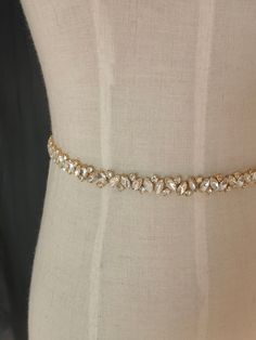 Color: rose gold\gold\silver width is 1.5 cm Crystal straps, wedding dress, Beaded shoulders, beaded belt, beaded straps, bridal accessories, Bridal Epaulettes, dress straps, Crystal straps, wedding dress, Beaded shoulders, beaded belt, beaded straps, bridal accessories, Bridal Epaulettes, Wedding dress straps, Bridal straps, dress straps, shoulder straps, bridal bling, dress straps ABBIE Diamante and pearl straps for a bride or your special occasion dress. Limited ready to sew on/in seam straps Gold Embellished Wedding Sash, Gold Embellished Sashes For Wedding, Elegant Gold Bridal Belt, Elegant Gold Bridal Belt For Bride, Elegant Gold Fitted Bridal Belt, Elegant Fitted Gold Bridal Belt, Fitted Gold Sash For Wedding, Elegant Bling Bridal Belt For Wedding, Gold Crystal Bridal Belt For Party