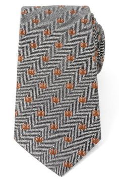 Small, bright pumpkins neatly punctuate a tie made with silk and linen in a herringbone weave that smartens any holiday look. 3" width; 59" length 50% silk, 30% cotton, 20% linen Dry clean Imported Elegant Fall Standard Tie, Elegant Fall Workwear Ties, Classic Fall Ties For Formal Occasions, Classic Ties For Formal Occasions In Fall, Classic Formal Ties For Fall, Classic Fall Formal Ties, Formal Fall Standard Tie Accessories, Formal Fall Standard Tie Suit Accessories, Formal Fall Suit And Tie Accessories Standard Tie