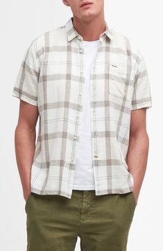 A gauzy blend of linen and silky lyocell brings relaxed comfort to a shirt patterned in a pale plaid and styled to be left untucked on warm, sunny days. 30" length, 44" chest (size medium) Front button closure Spread collar Short sleeves Chest patch pocket 55% linen, 45% lyocell Machine wash, line dry Imported Casual Flax Button-up Shirt, Relaxed Fit Rayon Shirt For The Beach, Relaxed Fit Rayon Shirt For Beach, Casual Button-up Rayon Shirt, Casual Rayon Button-up Shirt, Casual Flax Button-up Top, Casual Linen Shirt For Daywear, Casual Neutral Linen Tops, Casual Cotton Shirt In Flax Color