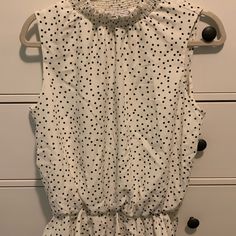 Sleeveless Polka Dot Blouse Never Worn! Large Cute Ruffle On Bottom Front Is Lined Polka Dot Sleeveless Blouse For Spring, Sleeveless Polka Dot Blouse For Spring, Sleeveless Polka Dot Top For Work, Polka Dot Sleeveless Top For Work, Casual Sleeveless Polka Dot Blouse, Polka Dot Sleeveless Casual Blouse, Elegant Sleeveless Polka Dot Top, Fitted Polka Dot Sleeveless Blouse, Cheap Polka Dot V-neck Top