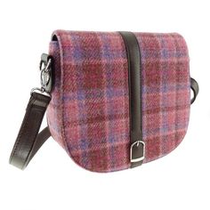 Harris Tweed 'Beauly' Shoulder Bag This smart and sophisticated Harris Tweed Shoulder Bag from Glen Appin is called the Beauly. Since it is made from genuine Harris Tweed it will last you forever. We Scots call Harris Tweed 'The Big Cloth' because of its incredible durability. In addition, the flap features a center strap and buckle along with a magnetic fastener button to ensure your items are secure. Along with an adjustable/detachable shoulder strap, its perfect for everyday. The inside of th Tweed Purse, Tweed Handbag, Tweed Bag, Tartan Blanket, Scottish Jewellery, Purple Heather, Inside Bag, Small Crosses, Harris Tweed