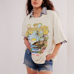 Fp X Daydreamer Beach Boys Surfin Usa One Size T Nwt Still In Manufacturers Packaging. This Is A One Size Daydreamer Tee. Oversized, Slouchy Fit. Soft, 100% Cotton. Vintage Style Print And Fabric. Beautiful Cream Background Color. Beach Boys, Cream Background, Blue Cream, Free People Tops, Vintage Style, Free People, Graphic Tees, Vintage Fashion, Womens Tops