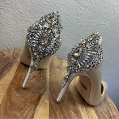 Badgley Mischka L 7.5 Gorgeous Ivory Rhinestone Embellished Bridal Wedding Heels. Fits Approximately : 7.5 Medium Width; Label States 7.5 - See Measurements. Width : Measured Across Widest Part Of Outsole Length : Measured Along Insole Heel Height : Nib. Excellent Condition. Never Worn - Includes Extra Rhinestones. 0090acc New To Poshmark? Use Code "Shesabettie" For $10 Off Your First Purchase! Elegant High Heel Crystal Wedding Shoes, Elegant Crystal High Heel Wedding Shoes, Glamorous Crystal Wedding Shoes For Prom, Pointed Toe Crystal Embellished Heels, Crystal Embellished Pointed Toe Heels, Crystal High Heels For Wedding, Crystal Wedding Shoes With Rhinestones For Prom, Elegant Embellished Wedding Shoes With Crystal, Crystal Embellished Wedding Heels