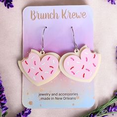 Introducing our adorable Heart Sugar Cookie earrings! These charming earrings are designed to look like miniature heart-shaped sugar cookies, complete with frosting, sprinkles, and even a bite taken out of the side. Lightweight and comfortable, they are perfect for everyday wear or special occasions where you want to express your love for all things cute and delicious. Whether you're a baking enthusiast or simply appreciate unique accessories, these Heart Sugar Cookie earrings are a delightful a Sweet Heart Earrings For Valentine's Day, Cute Pink Heart Earrings For Birthday, Cute Nickel-free Heart Earrings For Valentine's Day, Sweet White Heart Earrings For Valentine's Day, Sweet Dangle Heart Earrings For Gifts, Sweet White Heart Earrings, Sweet Heart-shaped Earrings For Gift, Sweet Heart-shaped Earrings For Valentine's Day, Cute Heart Earrings For Birthday