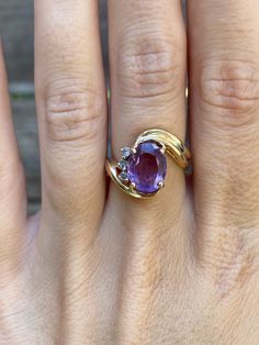 Total Weight: 5.1 grams Size: 6.75 Width: 2.6mm Amethyst: 10x7.8mm Diamonds: 1.5mm Condition: In great condition showing little wear with no damage. All gold has been thoroughly checked with an Olympus XRF spectrometer. It is guaranteed 14k gold.  All our jewelry is properly washed and disinfected to ensure customers get clean items with every order.  Returns accepted but may be subjected to a restock fee.  Please message with any questions:) Oval Amethyst Ring With Accent Stones For Anniversary, Oval Purple Amethyst Ring With Gemstone Accents, Formal Purple Birthstone Ring With Prong Setting, Oval Amethyst Ring Stamped 14k, Classic Purple Gemstone Birthstone Ring, Classic Amethyst Ring With Diamond, Classic Purple Birthstone Ring With Gemstone, Classic Amethyst Diamond Ring Birthstone, Classic Amethyst Diamond Ring With Birthstone Detail