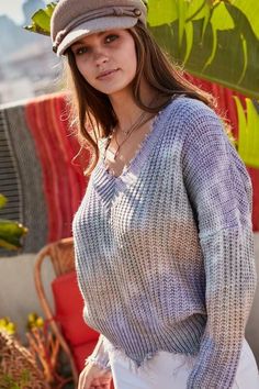 STYLE INFORMATION: Transition into cooler weather in the Easy Vibes Lavender Tie-Dye Snag Sweater! Distressed V-neck sweater in a lavender multi tie-dye print (in hues of lavender, blush, teal, and ivory) with long drop sleeves and slouchy fit. Ripped detail on neckline, sleeves, and hem. Wear with cute frayed hem jeans and booties for a chic cooler weather look. DETAILS & CARE: Acrylic Blend. Machine Wash Cold. Imported. SHIPPING: We offer free shipping over $100 for all orders in the Continent Cozy Purple Spring Tops, Casual Lavender Sweater For Fall, Casual Heather Sweater For Spring, Lavender Tie, Ripped Sweater, Boho Pink, Frayed Hem Jeans, Lavender Blush, Tie Dye Sweater