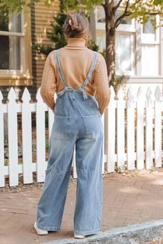 Elevate your boho style with the effortlessly cool Georgia Wide Leg Denim Overalls! Designed for those who love a retro vibe with a modern twist, these overalls are perfect for creating a relaxed yet chic look. The unique back knot detail enhances the overall design, giving these overalls a playful, bohemian finish. Pair with a fitted tee or a flowy blouse to create a carefree, boho-chic outfit that’s ready for anything! Chic High Waist Cotton Overalls, Medium Wash Overalls For Day Out, Light Wash Overalls For Fall, Chic Medium Wash Overalls For Spring, Chic Cotton Overalls With Bib Front, Trendy Light Wash Overalls For Fall, Fall Light Wash Overalls, Light Wash Denim Overalls For Fall, Denim Overalls For Day Out