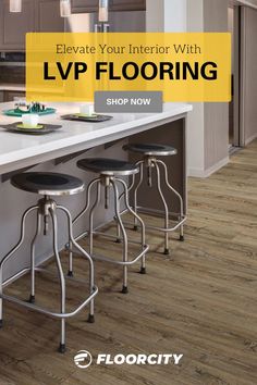 a kitchen island with stools in front of it and the words, elevate your interior with lvp flooring shop now