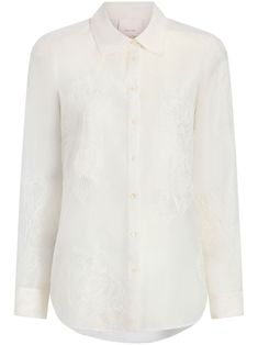 ivory white all-over floral embroidery straight-point collar front button fastening long sleeves buttoned cuffs curved hem Elegant Cream Blouse With Intricate Embroidery, Embroidered Long Sleeve Formal Tops, Fitted Floral Embroidery Shirt For Workwear, Luxury White Collared Blouse, Formal Long Sleeve Tops With Embroidered Cuffs, Embroidered Long Sleeve Tops For Formal Occasions, Luxury Long Sleeve Blouse For Wedding, Luxury Long Sleeve Tops For Wedding, Luxury Long Sleeve Wedding Blouse