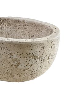 a large white bowl sitting on top of a table