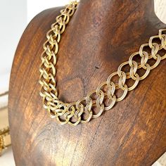 "High quality chunky gold chain necklace with quality clasp.  Details:  * Total Length: 17-18\" * Hangs to: Above Collar Bone -- Choker * Era: 70s * Plating: Gold Tone Measurements: Length 17.5 in / 44 cm . Very good condition.  Find more sparkly goodness at hellosparkly.com." Vintage Style Chunky Chain Necklace As Gift, Vintage Chunky Chain Necklace As Gift, Vintage Gold Chain Choker Necklace, Chunky Metal Chain Link Necklace, Gold Chunky Chain Choker Necklace, Vintage Gold Link Chain Necklace, Vintage Double Chain Metal Necklace, Vintage Gold-tone Double Chain Necklace, Vintage Chunky Gold Necklace