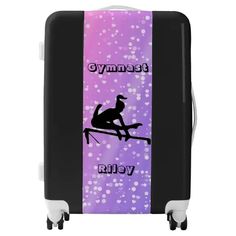 a purple and black luggage bag with a cat on it's side that says gymnastics alley