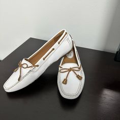 White Moccasins , Never Been Worn. Perfect Condition!!! White Moccasins With Flat Leather Sole, White Moccasins With Leather Sole And Flat Heel, White Leather Casual Moccasins, White Leather Slip-on Boat Shoes, White Casual Flat Heel Moccasins, White Casual Moccasins With Stitched Sole, White Casual Moccasins With Almond Toe, Casual White Moccasins With Stitched Sole, Casual White Almond Toe Moccasins