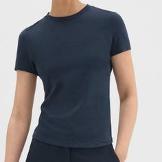 Fitted Stretch-Nylon Tee From Theory. Never Worn, Perfect Condition. Navy Fitted Modern Top, Modern Fitted Navy Tops, Modern Fitted Navy Top, Navy Stretch Top For Work, Navy Stretch Top For Workwear, Navy Stretch Tops For Work, Fitted Navy T-shirt For Spring, Classic Blue T-shirt For Casual Work, Classic Blue T-shirt For Work