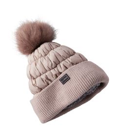 Warm, wind-resistant and great looking, the Puffer Pom Hat will be your go-to all winter long. Made from 100% recycled fabric. Insulation: 100% recylced polyester. Body: 100% recycled nylon. Handwash, dry flat. Faux fur pom adds a fun detail. PrimaLoft® insulation for reliable warmth. Imported. | Women's Puffer Pom Hat, Synthetic/Nylon Feather Comforter, Insulated Jacket Women, Cold Weather Hats, Chocolate Girls, Winter Hats For Men, Women's Headwear, Winter Hats Beanie, Winter Hats For Women, Womens Fleece