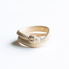 A wrap around sculpture snake with intricate detailing inside and out.  Metal: 14k yellow gold Approx 8mm band width (varies by size)  Available in rose, yellow or white gold.  FREE SHIPPING USA- All of our jewelry will arrive in custom packaging ready for gift giving.  SATISFACTION GUARANTEED All pieces are carefully examined prior to delivery.  If item is damaged upon delivery, we will offer full refund. Please first message us regarding your return within 24hrs. Please do send the item back i Luxury 14k Gold Snake-shaped Ring, Elegant Yellow Gold Snake Ring, Luxury Yellow Gold Snake Shaped Ring, Snake-shaped Yellow Gold Wedding Ring, 14k Gold Snake-shaped Ring, Yellow Gold Snake Ring For Wedding, Adjustable Snake Ring In Yellow Gold, Luxury 14k Gold Snake Ring, Elegant Gold Snake Ring