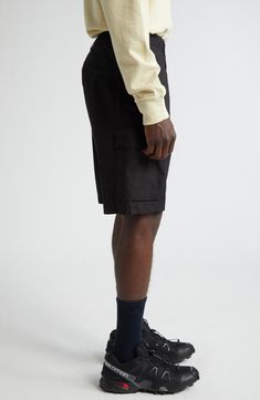 The label's signature compass patch brings adventure-ready appeal to stretch-cotton shorts equipped with plenty of handy pockets for essentials. 9" inseam; 20" leg opening; 12" front rise; 14" back rise (size 30) Zip fly with button closure Side-seam pockets; back welt pocket; cargo flap-patch pockets 97% cotton, 3% elastane Machine wash, line dry Imported Designer Clothing Utility Cargo Shorts With Short Legs, Black Cargo Shorts With Pockets, Cotton Cargo Shorts With Pockets For Hiking, Outdoor Shorts With Patch Pockets, Shorts With Patch Pockets For Outdoor Activities, Short Shorts With Patch Pockets For Outdoor Activities, Black Relaxed Fit Utility Cargo Shorts, Outdoor Cargo Shorts With Patch Pockets, Cargo Shorts With Patch Pockets For Outdoor