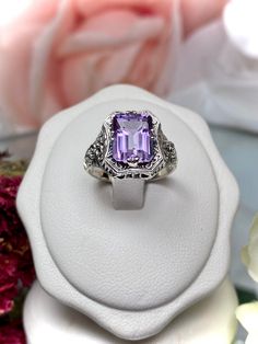 Natural Purple Amethyst Ring  Lovely Rectangle Design#148 Made To Order Make heads turn and stand out with this gorgeous piece of jewelry! This Edwardian reproduction filigree ring is made from sterling silver, and features an emerald cut high quality natural genuine purple amethyst gemstone measuring 9mm by 7mm (approximately 2.88 ct). From the beautiful intricate floral daisy design to the inside of the band marked 925 for sterling silver - this ring will take your look to the next level! Plus Luxury Sterling Silver Amethyst Birthstone Ring, Luxury Sterling Silver Amethyst Ring With Center Stone, Luxury Heirloom Amethyst Sterling Silver Ring, Luxury Heirloom Amethyst Ring In Sterling Silver, Luxury Lavender Amethyst Ring In Sterling Silver, Amethyst Mermaid Ring, Rectangle Design, Purple Amethyst Ring, Edwardian Jewelry