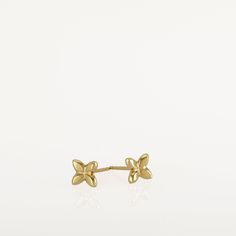 These are flower stud earrings, handmade of yellow 14k solid gold. Their finish is shiny, and they are comfortable to wear. Small and dainty, these gold studs are perfect for everyday's wear. Great as a gift as they can be enjoyed at any age and outfit. 14k solid gold ear backs are included. Size of the earrings is 5.3 x 5.8 mm = approx 0.2 x 0.22 inch * The earrings will be packed in a gift box ready to give as a gift, and shipped via Express mail service which usually takes 5-8 business days t Yellow Gold Flower Earrings In 14k, 14k Yellow Gold Flower Earrings Fine Jewelry, Dainty Yellow Gold Pierced Flower Earrings, Yellow Gold Hallmarked Flower Earrings For Gift, 14k Yellow Gold Flower Earrings, 14k Gold Flower Earrings For Pierced Ears, Classic Yellow Gold Flower Earrings, Classic Yellow Gold Flower Earrings For Pierced Ears, Dainty 14k Yellow Gold Flower Earrings