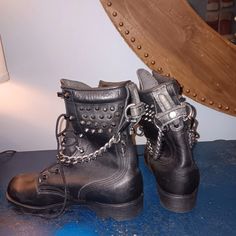 Vintage Leather Combat Boots, Done Over In A Punk Rock Or Gothic Style. Size 7 Edgy Studded Boots For Streetwear, Rocker Boots With Studs For Alternative Fashion, Alternative Studded Boots For Concert, Punk Moto Boots With Studded Outsoles For Concert, Punk Moto Boots With Studded Rubber Outsoles, Studded Alternative Style Boots For Concerts, Rocker Combat Boots With Round Toe For Alternative Fashion, Leather Grunge Boots With Studs, Grunge Leather Boots With Studs