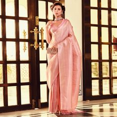 Peach colored saree is prettified with weaving work as shown which makes it appear classy. This saree is made of kanjivaran silk fabric which is accompanied with kanjivaran silk blouse piece which you can customise as per your design/style. Women can buy this saree to wear for their festive, party and functions, events and ideal for any fashionista. Note:- The actual product may differ slightly in color and design from the one illustrated in the images when compared with computer or mobile screen. Measurements: Saree : KanjiVaram : 5.5 Mtrs Blouse : KanjiVaram Silk : 0.8 Mtr Material: KanjiVaram Silk Stitch Type: Unstitched Country of Origin: India Care Guide: Dry Clean Blouse Kanjivaram, Peach Color Saree, Saree Kanjivaram, Silk Art, Mobile Screen, Chiffon Saree, Georgette Sarees, Style Women, Blouse Piece