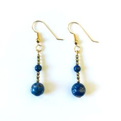 Lapis Lazuli and Gold Pyrite Earrings that dangle from a 14k gold filled hook ear wires. Beautiful earrings. Matching bracelet sold separately. Pyrite Earrings, Earrings Matching, Matching Bracelet, Etsy Earrings Dangle, Matching Bracelets, Ear Wires, Lapis Lazuli, Beautiful Earrings, Jewelry Earrings Dangle