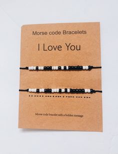 "📿You get two matching bracelets with this order.  📿Our delicate and simple Morse code bracelet is the ideal way to express your feelings for that special someone. The secret message \"I Love You\" is written in Morse code using dots and dashes and is made of black and white beads. The cord is made of nylon thread and can be adjusted to fit any wrist size. 📿 If you're looking for a different and meaningful way to express your love, the Morse code - I Love You bracelet is a great option. This I Love You Bracelet, Simple Handmade Beaded Bracelets As Gift, Morse Code Bracelet Messages, Minimalist Heart Beaded Bracelets As Gift, Couple Bracelets Morse Code, Relationship Crafts, Moris Code Bracelet, I Love You Morse Code Bracelet, I Love You Moris Code Bracelet