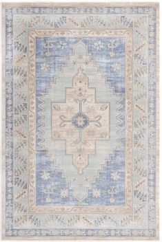 a blue and beige rug with an ornate design