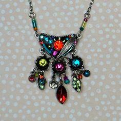 We might go as far to say that this necklace gives a garden full of blooming flowers a run for their money. The Firefly Botanical Bryn Necklace is simply bursting with color! You heard it here. We are still trying to catch our breath since we first laid eyes on this necklace and adds a dash of dazzle to your ensemble. We are certain that you will be reaching for the Firefly Botanical Bryn Necklace time and time again. Multi-color European crystals, Czech glass Chain approximately 18 inches long, Whimsical Multicolor Pendant Necklace, Whimsical Multicolor Dangle Necklaces, Nickel-free Multicolor Pendant Necklace, Multicolor Bohemian Flower Necklace For Jewelry Making, Multicolor Bohemian Flower Necklace For Crafts, Bohemian Multicolor Flower Necklace For Jewelry Making, Bohemian Multicolor Nickel-free Necklaces, Bohemian Multicolor Nickel-free Necklace, Unique Multicolor Jeweled Necklaces