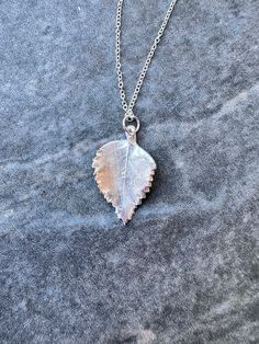 Unique handmade silver pendant made from a Silver Birch leaf from East Sussex, England With an 16 inch sterling silver chain. Please note-no hallmark on the pendant, but it is fine silver. Comes with a box Silver Leaf-shaped Nature-inspired Necklace, Silver Leaf-shaped Necklace Gift, Silver Leaf-shaped Necklaces For Gift, Silver Leaf-shaped Necklace For Gift, Handmade Silver Leaf-shaped Necklace, Silver Leaf-shaped Sterling Silver Necklace, Silver Leaf-shaped Jewelry, Sterling Silver Leaf Necklace, Birch Leaf