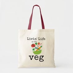 Livin Life on The Veg Vegan Vegetarian Humor Tote Bag Color: Natural and Red. Gender: unisex. Age Group: adult. Organic White Bags For Everyday Use, Organic Tote Bag For Gifts, Organic White Rectangular Bags, White Organic Rectangular Bags, White Rectangular Organic Bag, Everyday Organic Tote Bag, Organic Everyday Tote Bag, Organic Tote Bag For Everyday, Everyday Organic Rectangular Bag